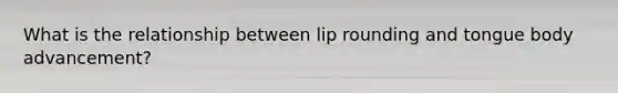 What is the relationship between lip rounding and tongue body advancement?