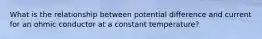 What is the relationship between potential difference and current for an ohmic conductor at a constant temperature?