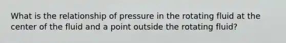 What is the relationship of pressure in the rotating fluid at the center of the fluid and a point outside the rotating fluid?