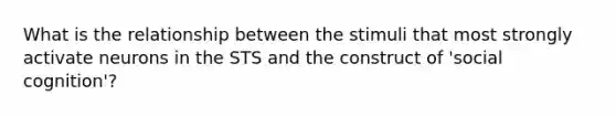 What is the relationship between the stimuli that most strongly activate neurons in the STS and the construct of 'social cognition'?