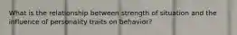 What is the relationship between strength of situation and the influence of personality traits on behavior?