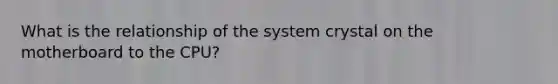 What is the relationship of the system crystal on the motherboard to the CPU?