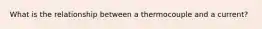 What is the relationship between a thermocouple and a current?