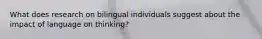 What does research on bilingual individuals suggest about the impact of language on thinking?