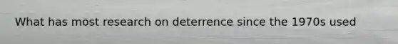 What has most research on deterrence since the 1970s used