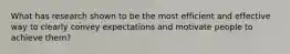 What has research shown to be the most efficient and effective way to clearly convey expectations and motivate people to achieve them?