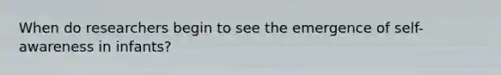 When do researchers begin to see the emergence of self-awareness in infants?