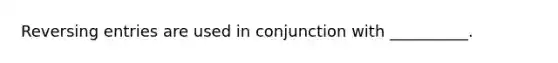 Reversing entries are used in conjunction with __________.