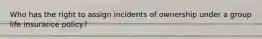 Who has the right to assign incidents of ownership under a group life insurance policy?