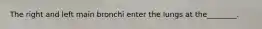 The right and left main bronchi enter the lungs at the________.