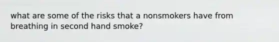 what are some of the risks that a nonsmokers have from breathing in second hand smoke?