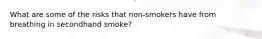 What are some of the risks that non-smokers have from breathing in secondhand smoke?