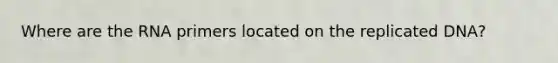 Where are the RNA primers located on the replicated DNA?