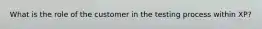 What is the role of the customer in the testing process within XP?