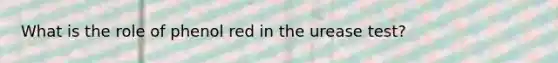 What is the role of phenol red in the urease test?