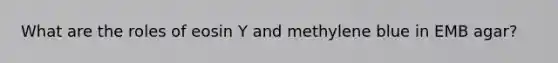 What are the roles of eosin Y and methylene blue in EMB agar?