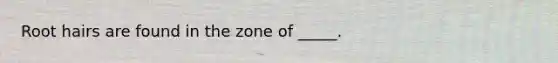Root hairs are found in the zone of _____.