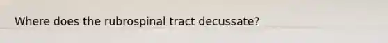 Where does the rubrospinal tract decussate?