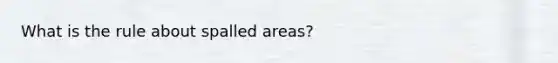 What is the rule about spalled areas?