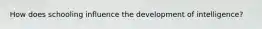 How does schooling influence the development of intelligence?