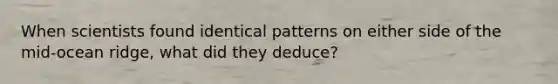 When scientists found identical patterns on either side of the mid-ocean ridge, what did they deduce?