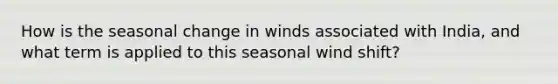 How is the seasonal change in winds associated with India, and what term is applied to this seasonal wind shift?