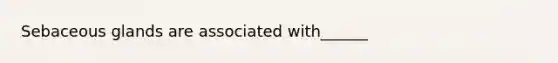 Sebaceous glands are associated with______