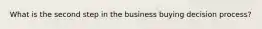 What is the second step in the business buying decision process?