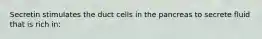 Secretin stimulates the duct cells in the pancreas to secrete fluid that is rich in: