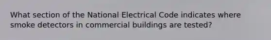 What section of the National Electrical Code indicates where smoke detectors in commercial buildings are tested?