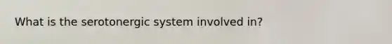 What is the serotonergic system involved in?