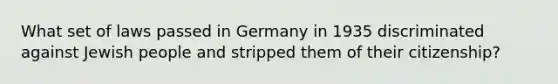 What set of laws passed in Germany in 1935 discriminated against Jewish people and stripped them of their citizenship?