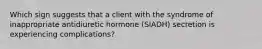 Which sign suggests that a client with the syndrome of inappropriate antidiuretic hormone (SIADH) secretion is experiencing complications?