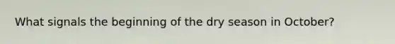 What signals the beginning of the dry season in October?