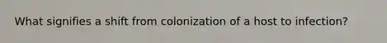 What signifies a shift from colonization of a host to infection?