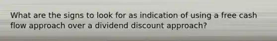 What are the signs to look for as indication of using a free cash flow approach over a dividend discount approach?