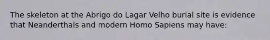 The skeleton at the Abrigo do Lagar Velho burial site is evidence that Neanderthals and modern Homo Sapiens may have: