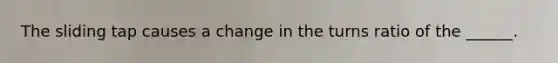 The sliding tap causes a change in the turns ratio of the ______.