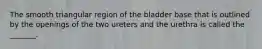 The smooth triangular region of the bladder base that is outlined by the openings of the two ureters and the urethra is called the _______.