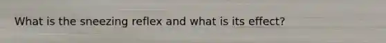 What is the sneezing reflex and what is its effect?