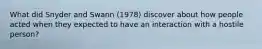 What did Snyder and Swann (1978) discover about how people acted when they expected to have an interaction with a hostile person?