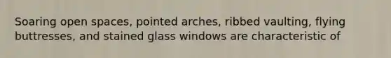 Soaring open spaces, pointed arches, ribbed vaulting, flying buttresses, and stained glass windows are characteristic of