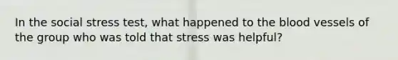 In the social stress test, what happened to the blood vessels of the group who was told that stress was helpful?