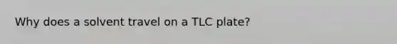 Why does a solvent travel on a TLC plate?