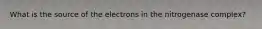 What is the source of the electrons in the nitrogenase complex?