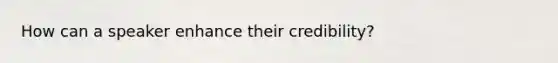 How can a speaker enhance their credibility?