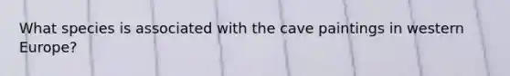 What species is associated with the cave paintings in western Europe?