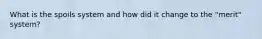 What is the spoils system and how did it change to the "merit" system?
