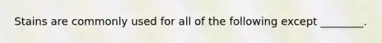 Stains are commonly used for all of the following except ________.