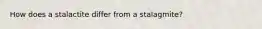 How does a stalactite differ from a stalagmite?